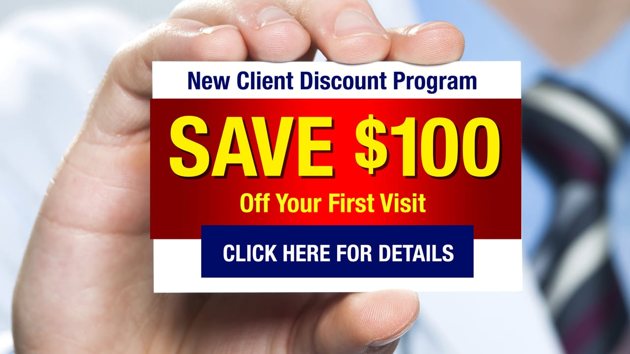 doctor holds a card that reads "new clients save $100